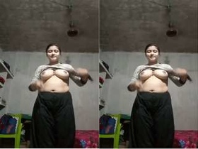 A stunning Bangla girl flaunts her breasts in a steamy video