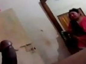 Desi bhabhi gives a blowjob to her brother and checks for visitors