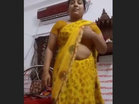 Stunning wife removes her sari and creates a video for her admirers