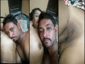 Passionate kissing between a naked Indian girl and her lover
