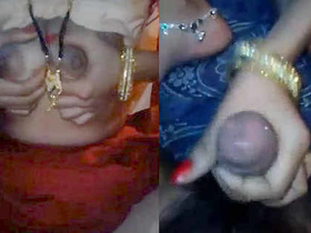 Indian wife has sex with her husband while also fondling her own breasts