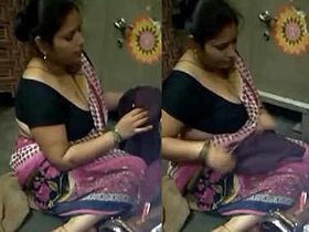 Steamy mature lady's bosom on display