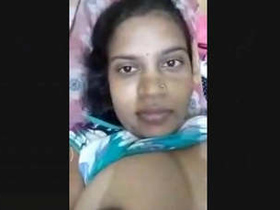 Boudi reveals her breasts during a video chat