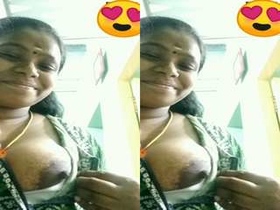 Exclusive video of a shy Mallu bhabhi exposing her breasts