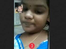 A charming girl displays her breasts