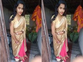Desi college girl gives a sensual striptease