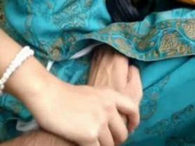 Desi college girl's big boobs pushed together in video