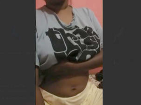 Indian mature woman revealing her large breasts