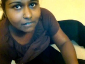 Indian woman in a hotel room