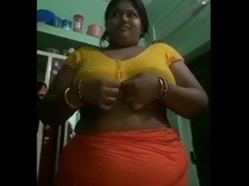 Mature south Indian bhabhi's breasts revealed