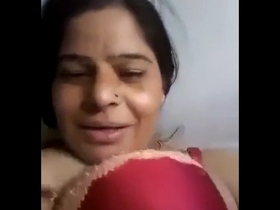 Middle-aged Indian woman pleasures herself and experiences squirting in rural setting