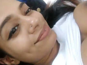 Cute girl from Sri Lanka records herself in a selfie video