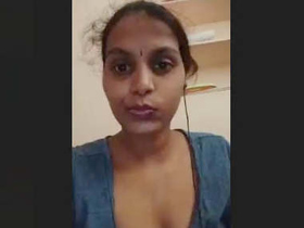 Tamil girl with huge breasts shows them off in leaked video