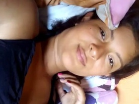Watch a Desi bhabi show off her black belly and pussy in this steamy video