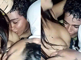 A group of boys fondle the breasts of a seductive inexperienced girl