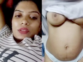 Bhabi Kusum flaunts her natural, huge breasts in a lewd video