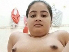 Watch a stunning Indian girl in the bathroom, completely naked