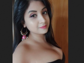 Desi babe flaunts her curves in a revealing outfit