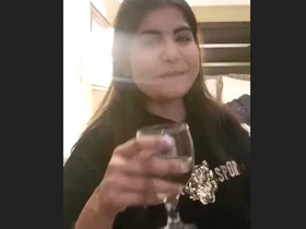 A Pakistani woman with large breasts engages in explicit behavior while recorded in high-quality Hindi sound