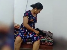 Dressing up after a passionate encounter with a village bhabi