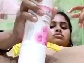 Indian girl uses air freshener to stimulate her vagina