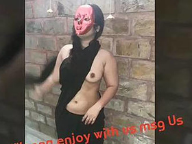 Ravina's sensual performance without a top