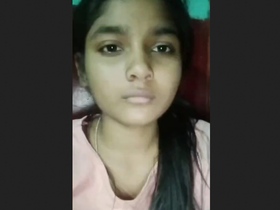 Cute Indian girl shows off her body in a steamy video