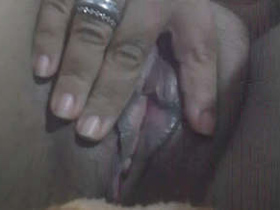Indian wife indulges in self-pleasure by fingering her intimate area