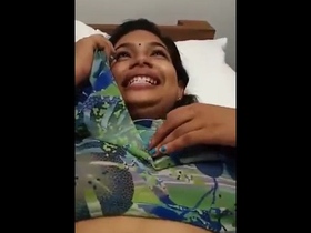 Watch a Tamil wife's facial expressions as she gets horny while fingering