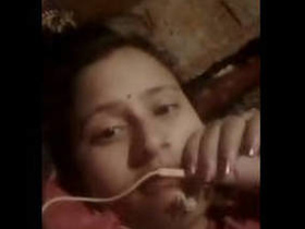 Desi wife chats with husband in village setting