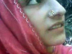 Village girl with large breasts fondling themself