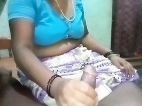 Elder Indian aunt performs a sensual oral sex act on her younger partner