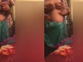 Mallu aunty strips down and gets her breasts fondled by her husband
