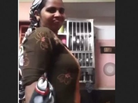 Indian woman from a village flaunts her breasts in a video call
