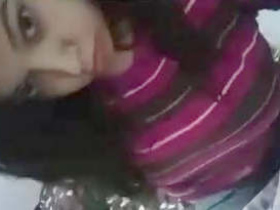 Randi flaunts her breasts in a provocative manner