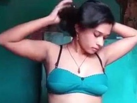 Naughty Indian girl strips and shows off her nude body in a sexy video