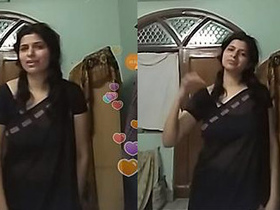 Indian aunt performs sensually in dark see-through saree