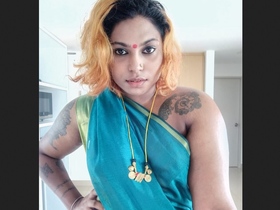Tamil NRI bhabhi cooks in the kitchen without a bra