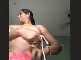 Hidden camera captures Mallu bhabhi's big boobs in steamy video