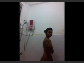 Sanjana, an enticing Indian teen with dark hair, relishes her private bathroom time