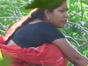 A hidden camera captures a Desi woman's peeing in public