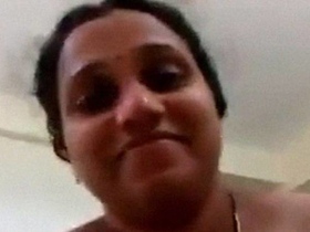 Indian auntie rides on top in home video