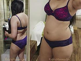 Rati, the hot mallu bhabi, walks around the house grooming her hair