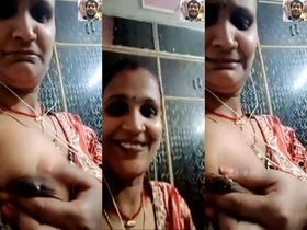 Bhabhi from India flaunts her breasts in MMS video