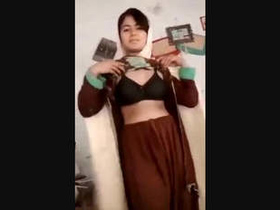 Pathan beauty flaunts her breasts in a seductive video