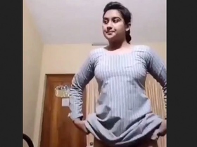 Sexy Desi bhabi unveiling her body in a sexy dress