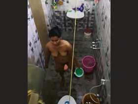 Peeping neighbor watches naked girl in bathtub