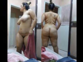 Mature Indian aunt with a big butt gets naughty