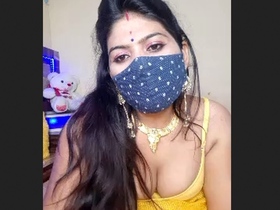 Geeta Bhabhi's boobs and milk play in this video