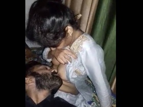Desi couple's passionate boob kissing and sucking session